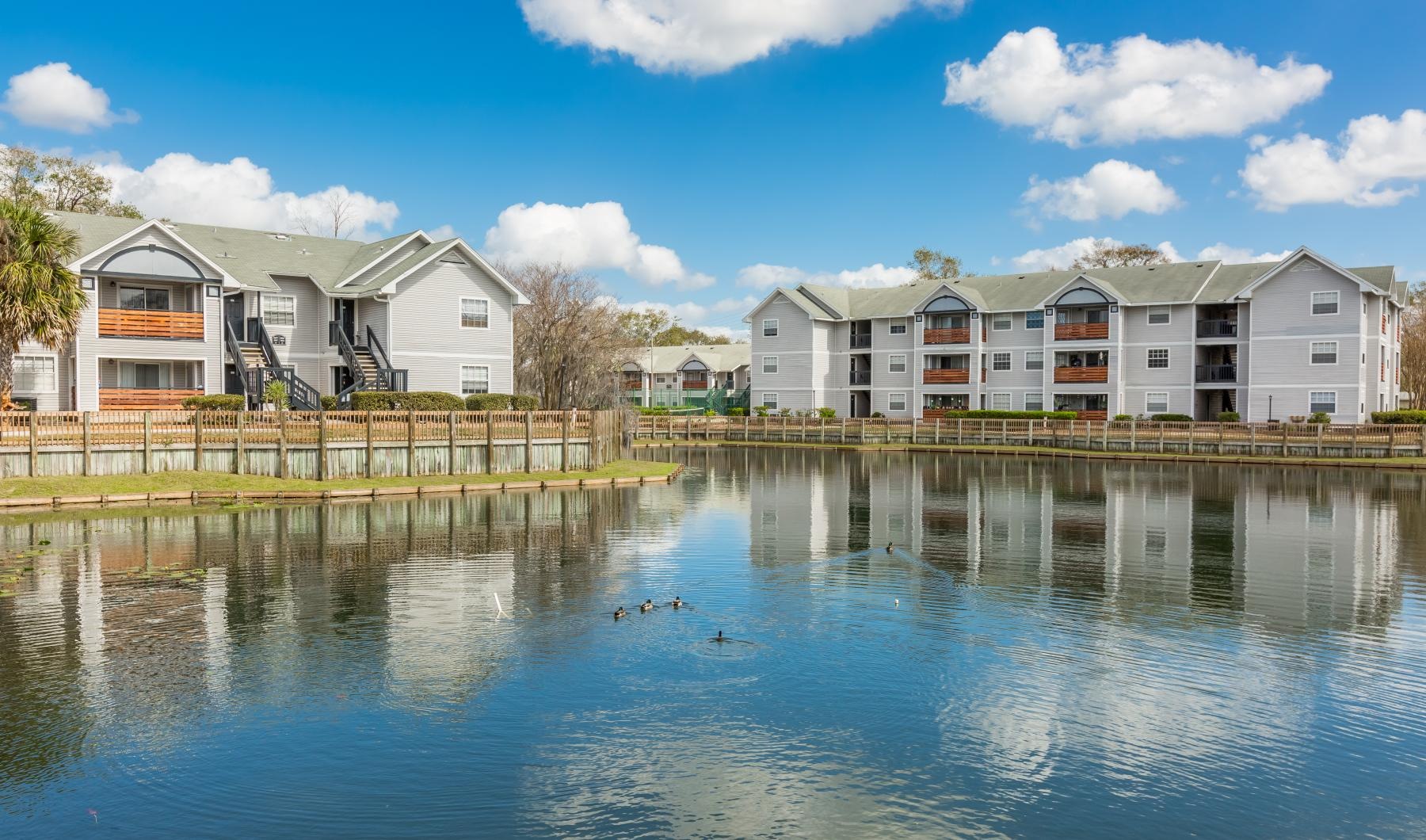 a body of water with buildings along it